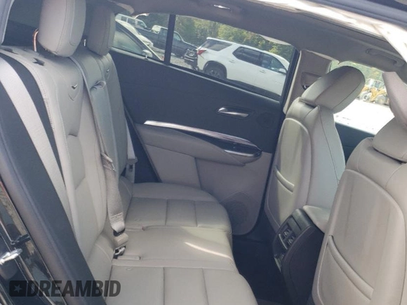 2023 Cadillac XT4 AWD Luxury with VIN 1GYFZBR49PF101377, listed as a Copart auction lot 73961294 with 26,847 mi miles and Salvage Title. Bid and sale history available at carsss.com. Image 12.