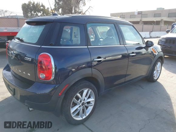 2014 MINI Countryman with VIN WMWZB3C50EWR42268, listed as a IAAI auction lot 41845750 with 117,192 mi miles and . Bid and sale history available at DreamBid. Image 4.