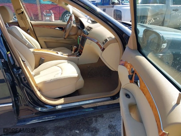 2009 Mercedes-Benz E-Class 3.0L with VIN WDBUF22X79B395557, listed as a IAAI auction lot 41672452 with 91,354 mi miles. Bid and sale history available at carsss.com. Image 5.