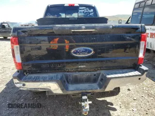 2017 Ford F-250 Lariat z VIN 1FT7W2BTXHEF17286, wystawiony jako Copart lot #55722875 z przebiegiem 75 231 mil mil oraz Czysty tytuł • Clean title. Historia ofert i sprzedaży dostępna na DreamBid. Obrazek 6.