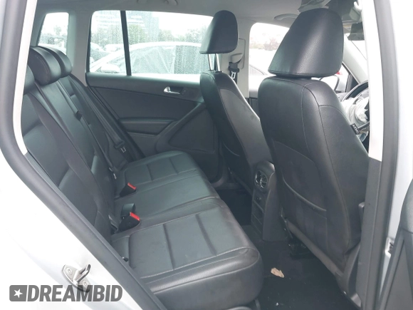 2011 Volkswagen Tiguan SEL w/Premium Navi with VIN WVGAV7AX7BW547613, listed as a IAAI auction lot 41916574 with 140,385 mi miles and . Bid and sale history available at DreamBid. Image 8.