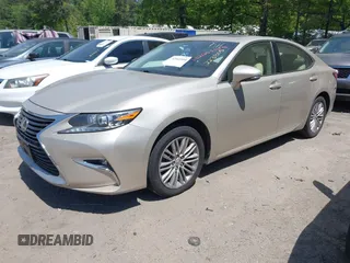 2016 Lexus ES with VIN JTHBK1GG3G2223805, listed as a IAAI auction lot 42065504 with 210,363 mi miles. Bid and sale history available at carsss.com. Image 2.