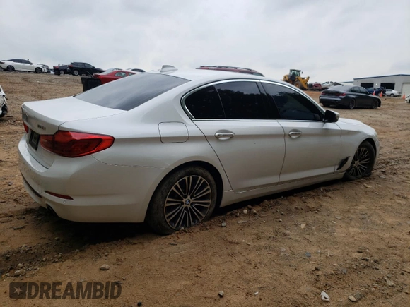 2018 BMW 5 Series 530i with VIN WBAJA5C53JG898430, listed as a Copart auction lot 54243195 with 129,854 mi miles and Salvage title. Bid and sale history available at DreamBid. Image 3.