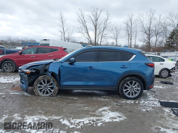2020 Mazda CX-5 Grand Touring with VIN JM3KFBDM2L0778831, listed as a IAAI auction lot 41739655 with 72,533 mi miles. Bid and sale history available at carsss.com. Image 15.
