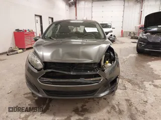 2015 Ford Fiesta SE z VIN 3FADP4EJ8FM138306, wystawiony jako IAAI lot #41227124 z przebiegiem 106 741 mil mil oraz . Historia ofert i sprzedaży dostępna na DreamBid. Obrazek 12.