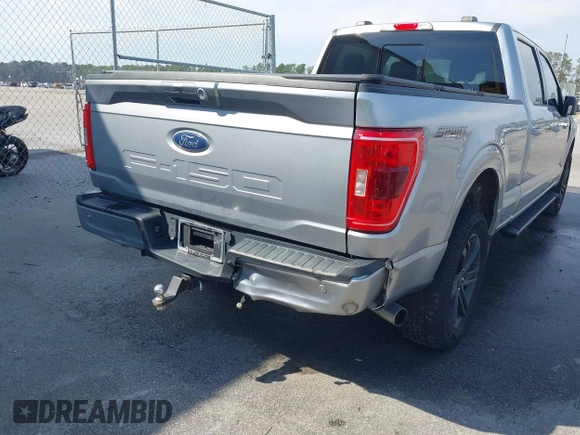 2021 Ford F-150 XL with VIN 1FTFW1E52MFC44822, listed as a IAAI auction lot 41657464 with 83,994 mi miles. Bid and sale history available at carsss.com. Image 6.