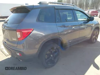 2021 Honda Passport Elite with VIN 5FNYF8H07MB018359, listed as a IAAI auction lot 41834413 with 28,278 mi miles and . Bid and sale history available at DreamBid. Image 4.
