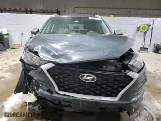 2020 Hyundai Tucson Value with VIN KM8J3CA4XLU163763, listed as a Copart auction lot 83841054 with 59,019 mi miles and Salvage Title. Bid and sale history available at carsss.com. Image 5.