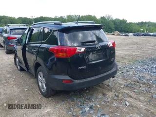 2013 Toyota RAV4 XLE with VIN 2T3RFREV9DW057202, listed as a IAAI auction lot 42485454 with 207,032 mi miles and . Bid and sale history available at DreamBid. Image 3.