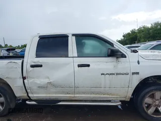 2012 Ram 1500 Express with VIN 1C6RD7KT1CS205659, listed as a IAAI auction lot 42614472 with Not provided miles and . Bid and sale history available at DreamBid. Image 12.