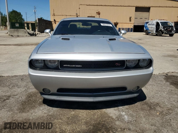 2012 Dodge Challenger R/T z VIN 2C3CDYBT0CH259731, wystawiony jako Copart lot #58033035 z przebiegiem 142 427 mil mil oraz Czysty tytuł • Clean title. Historia ofert i sprzedaży dostępna na DreamBid. Obrazek 5.