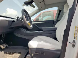 2024 Tesla Model Y Long Range with VIN 7SAYGDEE6RA290124, listed as a Copart auction lot 57662385 with 14,751 mi miles and Salvage title. Bid and sale history available at DreamBid. Image 7.