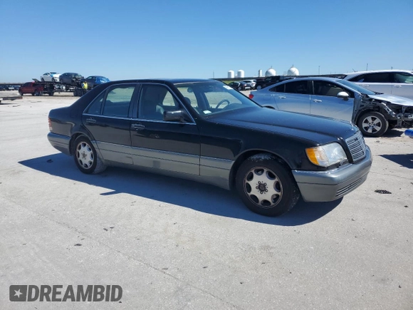 1995 Mercedes-Benz S 320 with VIN WDBGA32E7SA235612, listed as a Copart auction lot 46911705 with 119,900 mi miles and Clean Title. Bid and sale history available at DreamBid. Image 4.