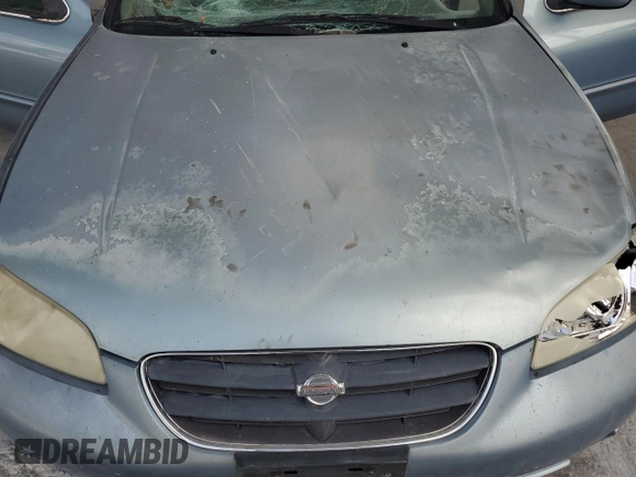 2000 Nissan Maxima GXE with VIN JN1CA31A1YT223132, listed as a Copart auction lot 60148655 with 269,258 mi miles and Salvage title. Bid and sale history available at DreamBid. Image 11.