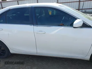 2015 Toyota Camry XLE with VIN 4T4BF1FK8FR482144, listed as a IAAI auction lot 42041282 with 191,272 mi miles and . Bid and sale history available at DreamBid. Image 13.