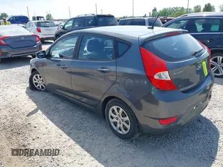2013 Hyundai Accent GS with VIN KMHCT5AE7DU094139, listed as a IAAI auction lot 42312906 with 160,146 mi miles and . Bid and sale history available at DreamBid. Image 3.