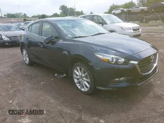 2017 Mazda 3 Touring z VIN 3MZBN1L79HM122581, wystawiony jako IAAI lot #42705624 z przebiegiem 52 175 mil mil oraz . Historia ofert i sprzedaży dostępna na DreamBid. Obrazek 1.