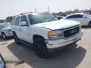 2003 GMC Yukon SLT with VIN 1GKEC13Z33R156583, listed as a IAAI auction lot 41831947 with 156,309 mi miles. Bid and sale history available at carsss.com. Image 1.