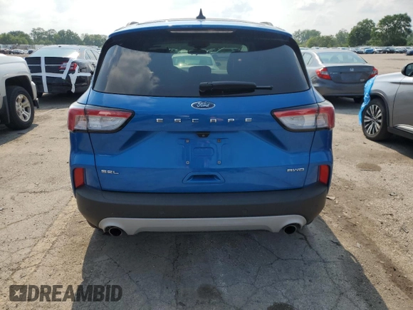2021 Ford Escape SEL with VIN 1FMCU9H63MUA70536, listed as a Copart auction lot 59967975 with 79,389 mi miles and Salvage title. Bid and sale history available at DreamBid. Image 6.