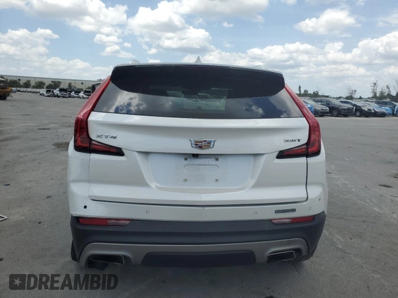2020 Cadillac XT4 FWD Premium Luxury z VIN 1GYFZCR4XLF005029, wystawiony jako Copart lot #55274025 z przebiegiem 50 550 mil mil oraz Szkoda całkowita • Salvage title. Historia ofert i sprzedaży dostępna na DreamBid. Obrazek 6.