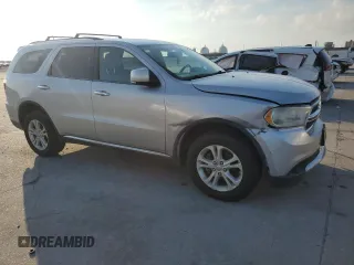 2013 Dodge Durango Crew with VIN 1C4RDHDG1DC616909, listed as a Copart auction lot 61923565 with 98,264 mi miles and Salvage title. Bid and sale history available at DreamBid. Image 4.