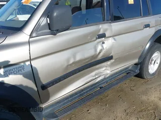 2001 Mitsubishi Montero Sport ES with VIN JA4LS21H91P021312, listed as a IAAI auction lot 40934279 with 268,703 mi miles. Bid and sale history available at carsss.com. Image 6.