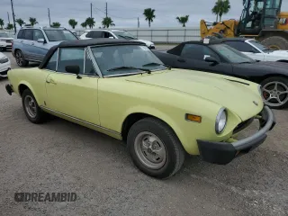 1978 FIAT 124 Spider z VIN 124CS10126825, wystawiony jako Copart lot #75075504 z przebiegiem 94 895 mil mil oraz Szkoda całkowita • Salvage title. Historia ofert i sprzedaży dostępna na DreamBid. Obrazek 4.