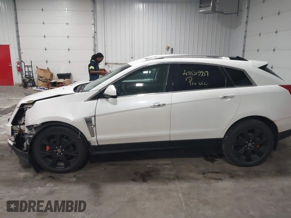 2012 Cadillac SRX Premium Collection with VIN 3GYFNFE39CS561614, listed as a IAAI auction lot 42529959 with 59,088 mi miles and . Bid and sale history available at DreamBid. Image 14.