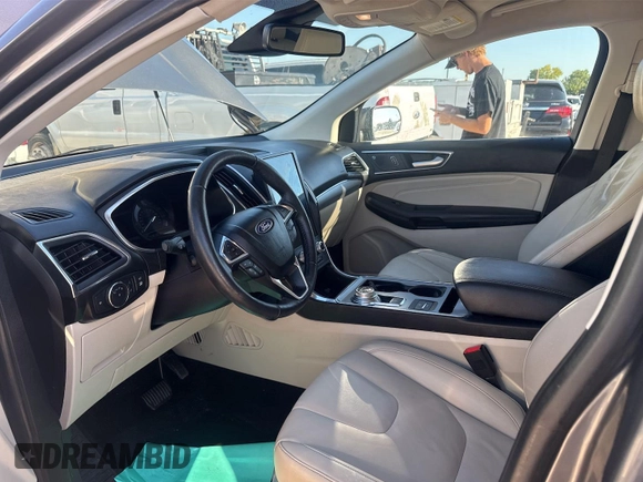 2021 Ford Edge Titanium with VIN 2FMPK3K96MBA51234, listed as a IAAI auction lot 42886659 with 74,183 mi miles and . Bid and sale history available at DreamBid. Image 17.