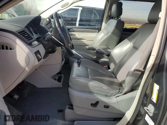 2011 Volkswagen Routan SE with VIN 2V4RW3DGXBR642528, listed as a Copart auction lot 45082055 with 167,067 mi miles and Salvage title. Bid and sale history available at DreamBid. Image 7.