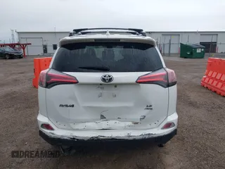 2018 Toyota RAV4 LE with VIN JTMBFREV8JJ722277, listed as a IAAI auction lot 42075684 with 203,458 mi miles and . Bid and sale history available at DreamBid. Image 16.