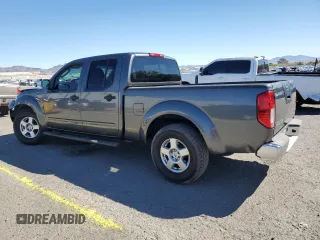 2008 Nissan Frontier SE with VIN 1N6AD09U78C428198, listed as a Copart auction lot 50602745 with 172,886 mi miles and Salvage title. Bid and sale history available at DreamBid. Image 2.