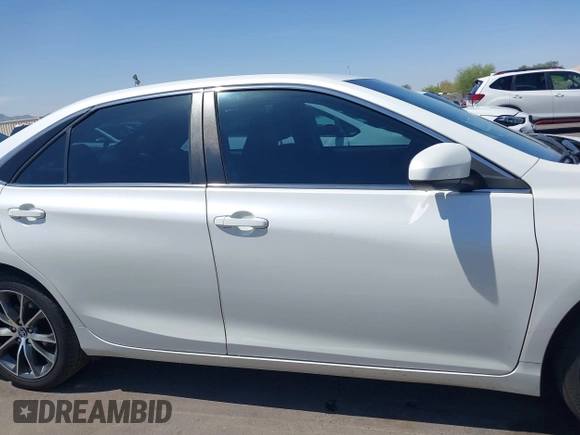 2015 Toyota Camry XLE with VIN 4T1BF1FK4FU477825, listed as a IAAI auction lot 41988429 with 156,886 mi miles and . Bid and sale history available at DreamBid. Image 14.