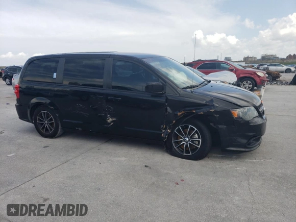 2018 Dodge Grand Caravan SE Plus with VIN 2C4RDGBG2JR199767, listed as a Copart auction lot 54182325 with 137,522 mi miles and Salvage Title. Bid and sale history available at DreamBid. Image 4.