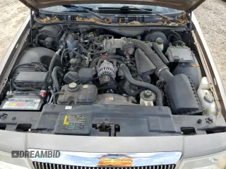 2005 Mercury Grand Marquis LS Premium z VIN 2MEFM75W65X609038, wystawiony jako Copart lot #55766005 z przebiegiem 132 136 mil mil oraz Szkoda całkowita • Salvage title. Historia ofert i sprzedaży dostępna na DreamBid. Obrazek 11.