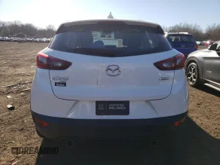 2016 Mazda CX-3 Touring z VIN JM1DKFC77G0136787, wystawiony jako Copart lot #50697845 z przebiegiem 96 277 mil mil oraz Szkoda całkowita • Salvage title. Historia ofert i sprzedaży dostępna na DreamBid. Obrazek 6.