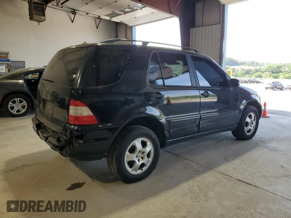 2003 Mercedes-Benz M-Class 3.2L with VIN 4JGAB54EX3A397258, listed as a Copart auction lot 67455154 with 176,642 mi miles and Salvage Title. Bid and sale history available at carsss.com. Image 3.