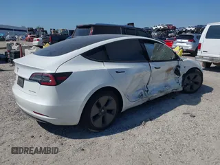 2022 Tesla Model 3 Long Range with VIN 5YJ3E1EB1NF116850, listed as a IAAI auction lot 42062677 with 48,744 mi miles and . Bid and sale history available at DreamBid. Image 4.