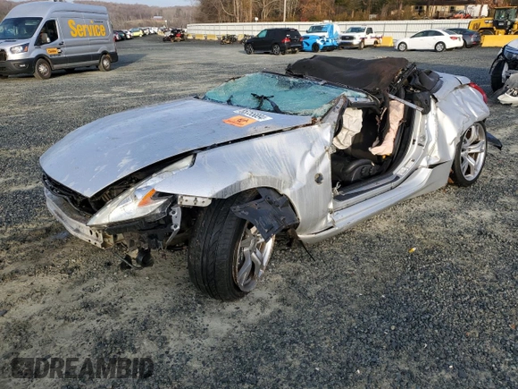 2012 Nissan 370Z Touring z VIN JN1AZ4FH5CM370505, wystawiony jako Copart lot #85255894 z przebiegiem Nie podano mil oraz Szkoda całkowita • Salvage title. Historia ofert i sprzedaży dostępna na DreamBid. Obrazek 1.