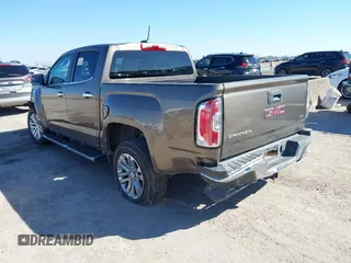 2015 GMC Canyon 2WD SLT with VIN 1GTG5CE32F1215628, listed as a IAAI auction lot 41412762 with 182,615 mi miles. Bid and sale history available at carsss.com. Image 3.