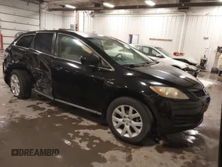 2008 Mazda CX-7 Sport with VIN JM3ER293880212717, listed as a IAAI auction lot 41548882 with 94,229 mi miles. Bid and sale history available at carsss.com. Image 1.