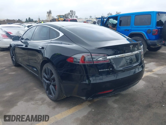 2018 Tesla Model S 75D with VIN 5YJSA1E42JF265691, listed as a IAAI auction lot 41886105 with 99,485 mi miles and . Bid and sale history available at DreamBid. Image 3.