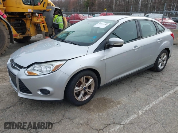 2014 Ford Focus SE with VIN 1FADP3F24EL285126, listed as a IAAI auction lot 41956143 with 113,415 mi miles. Bid and sale history available at carsss.com. Image 2.