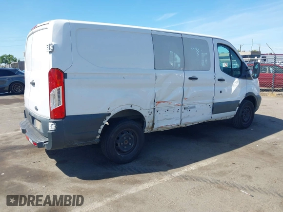 2016 Ford Transit Cargo with VIN 1FTYR1ZM3GKA69459, listed as a IAAI auction lot 42267325 with 183,940 mi miles and . Bid and sale history available at DreamBid. Image 4.