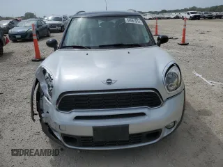 2014 MINI Countryman S with VIN WMWZC5C55EWM18087, listed as a Copart auction lot 68661614 with Not provided miles and Salvage title. Bid and sale history available at DreamBid. Image 5.