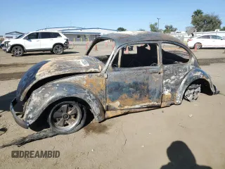 1965 Volkswagen Beetle with VIN 115503452, listed as a Copart auction lot 77280884 with Not Provided miles and Non Repairable. Bid and sale history available at DreamBid. Image 1.