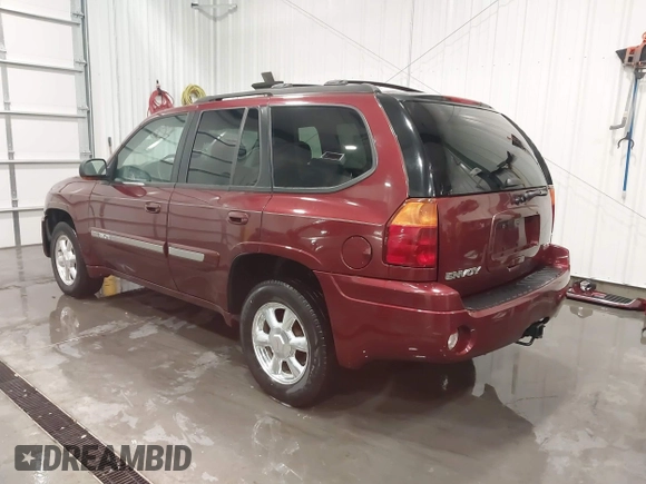 2005 GMC Envoy SLT with VIN 1GKDT13S752214687, listed as a IAAI auction lot 41421248 with 145,388 mi miles. Bid and sale history available at carsss.com. Image 3.