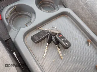 2000 Honda Odyssey EX z VIN 2HKRL1879YH516264, wystawiony jako IAAI lot #42109480 z przebiegiem 214 414 mil mil oraz . Historia ofert i sprzedaży dostępna na DreamBid. Obrazek 11.