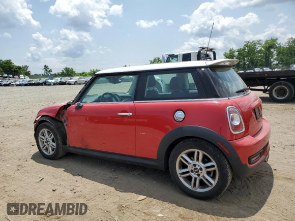 2013 MINI Hardtop S with VIN WMWSV3C59DT479278, listed as a Copart auction lot 60031535 with 82,166 mi miles and Salvage title. Bid and sale history available at DreamBid. Image 2.