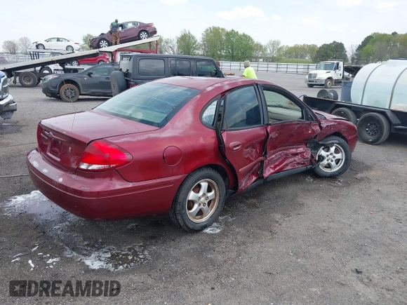 2004 Ford Taurus SES with VIN 1FAFP55284G188993, listed as a IAAI auction lot 41895733 with Not Provided miles and . Bid and sale history available at DreamBid. Image 4.